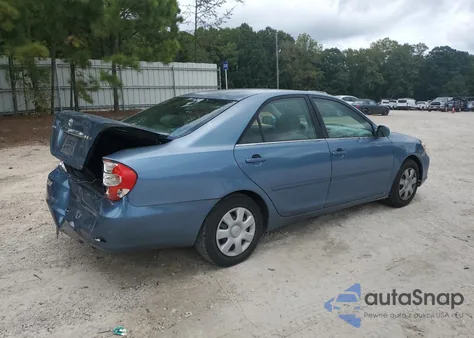 2002 Toyota Camry Le z USA, uszkodzony, nr VIN 4T1BE32KX2U568726